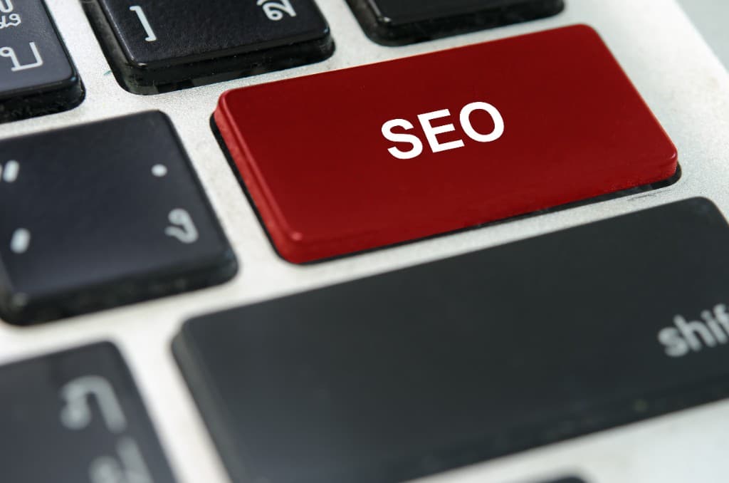 Red SEO key on a computer keyboard